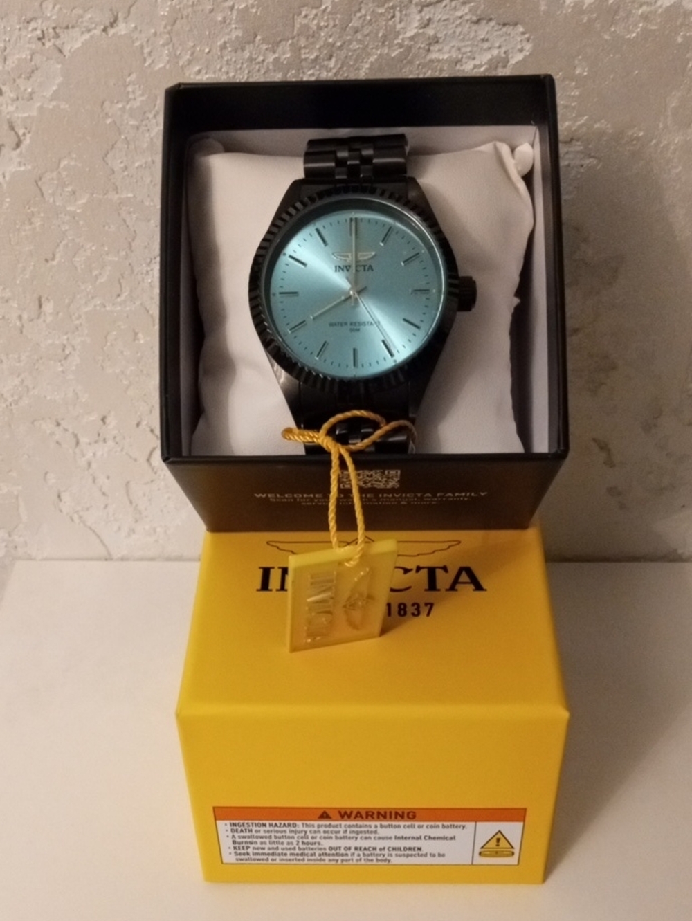 Invicta Black Watch with Teal Dial